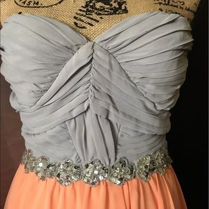 Gray with peachy dress